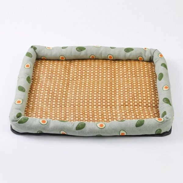 petzvibes-natural-rattan-cooling-pet-bed-mat-avocado-print-studio.jpg PetzVibes Natural Rattan Cooling Pet Bed Mat for dogs and cats in Avocado Print design — studio product photo showing natural golden-honey woven rattan center and padded sage green Oxford fabric border
