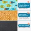 PetzVibes Breathable Rattan Pet Cooling Mat Tropical Fish Print material breakdown showing waterproof aqua Oxford fabric border, natural golden-honey rattan weave surface, and dark charcoal anti-slip base