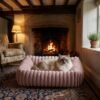 plush-ribbed-calming-pet-bed-cats-dogs-pink-ragdoll-cat-british-cottage.jpg Ragdoll cat with blue eyes resting in a PetzVibes pink plush ribbed calming pet bed beside a stone fireplace in a cozy British cottage living room