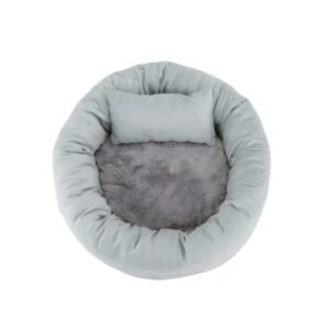 Blue-grey round calming bolster pet bed with plush dark grey faux fur interior and built-in head pillow, top view on white background